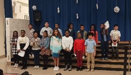  Student council candidates standing on the stage. 